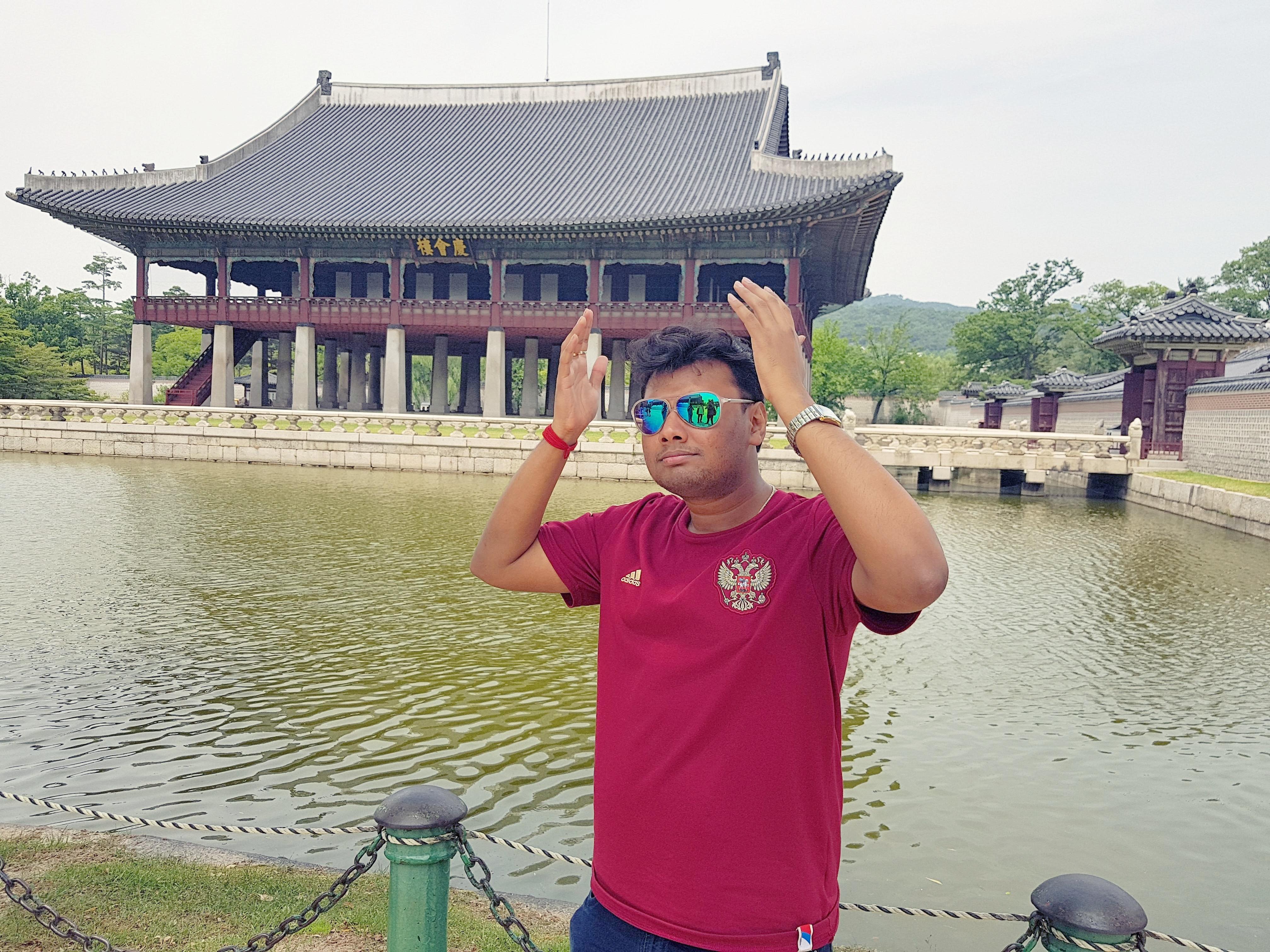 Sourav Ghosh, standing in palace premises in Seoul, South Korea